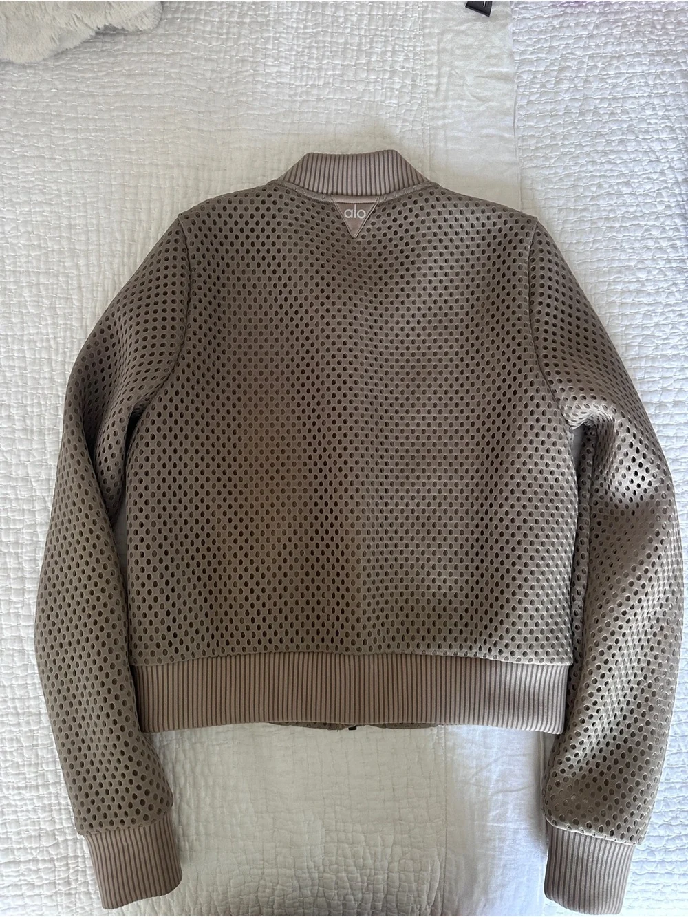 ALO Yoga Perforated Bomber Jacket in Taupe